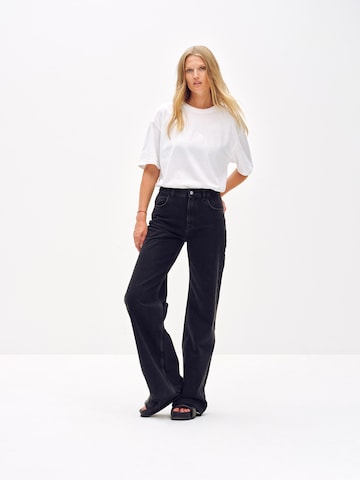 ABOUT YOU x Toni Garrn Wide leg Jeans 'Glenn' in Black