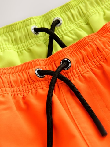 Next Ujumispüksid, värv kollane