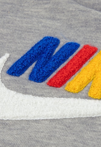 Nike Sportswear Träningsoverall 'CLUB' i grå