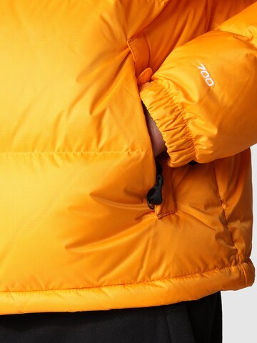 THE NORTH FACE Regular fit Zimska jakna 'M 1996 Retro Nuptse' | oranžna barva