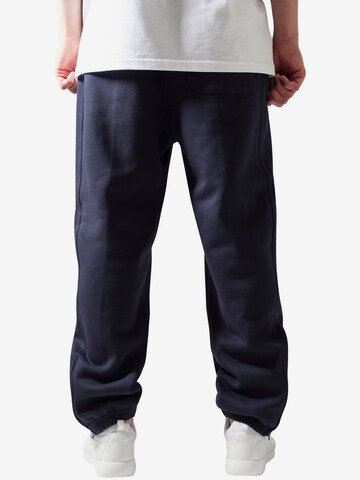 Tapered Pantaloni di Urban Classics in blu