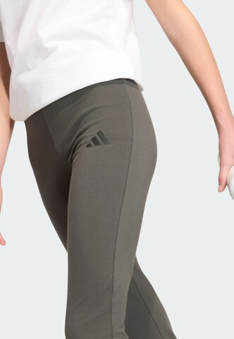 Flared Pantaloni sportivi 'Essentials' di ADIDAS SPORTSWEAR in grigio