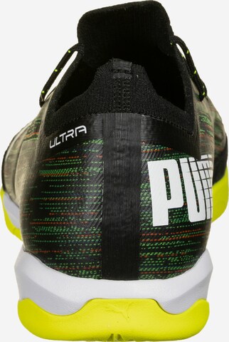 Chaussure de foot 'Ultra 1.2 Pro' PUMA en noir
