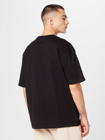 T-Shirt Pegador en noir