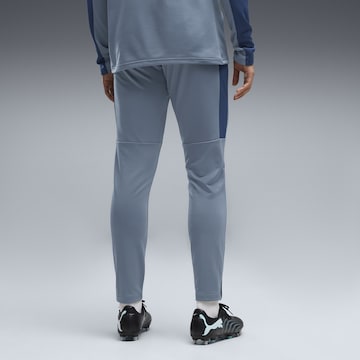 PUMA Tapered Sportbroek in Blauw