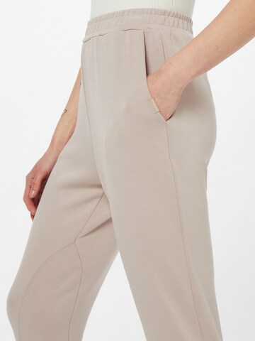 Athlecia Slim fit Outdoor Pants 'Aoma' in Pink