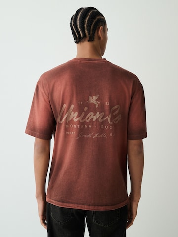 Next Póló - piros: elől