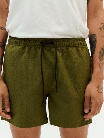 Thinking MU Board Shorts in Green: front