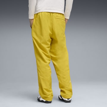 PUMA Regular Sportbroek 'BMW M Motorsport M3 T7' in Geel