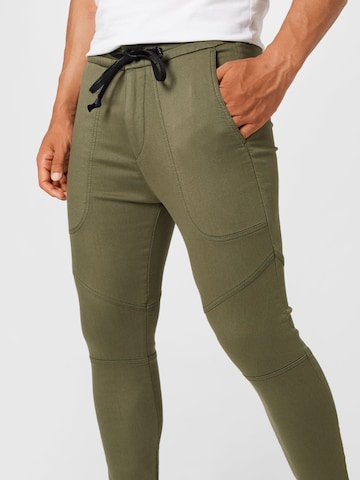 DRYKORN Slim fit Trousers 'KAB' in Green