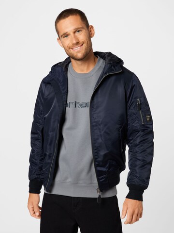 Veste mi-saison Superdry en bleu : devant