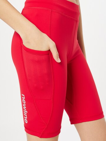 Coupe slim Pantalon de sport Newline en rouge