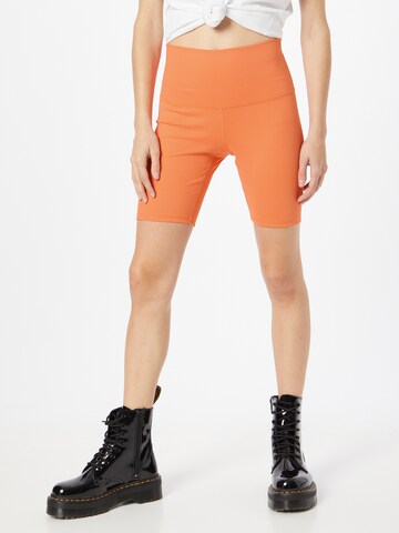 LEVI'S ® Slim fit Leggings 'Youth Bike Short' in Orange: front