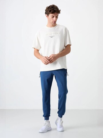 Tapered Pantaloni di Tommy Life in blu