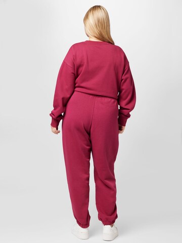 Tapered Pantaloni 'Adicolor Essentials ' di ADIDAS ORIGINALS in rosso