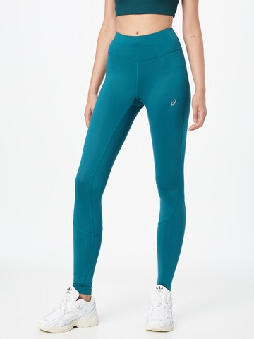 Skinny Pantalon de sport ASICS en vert : devant