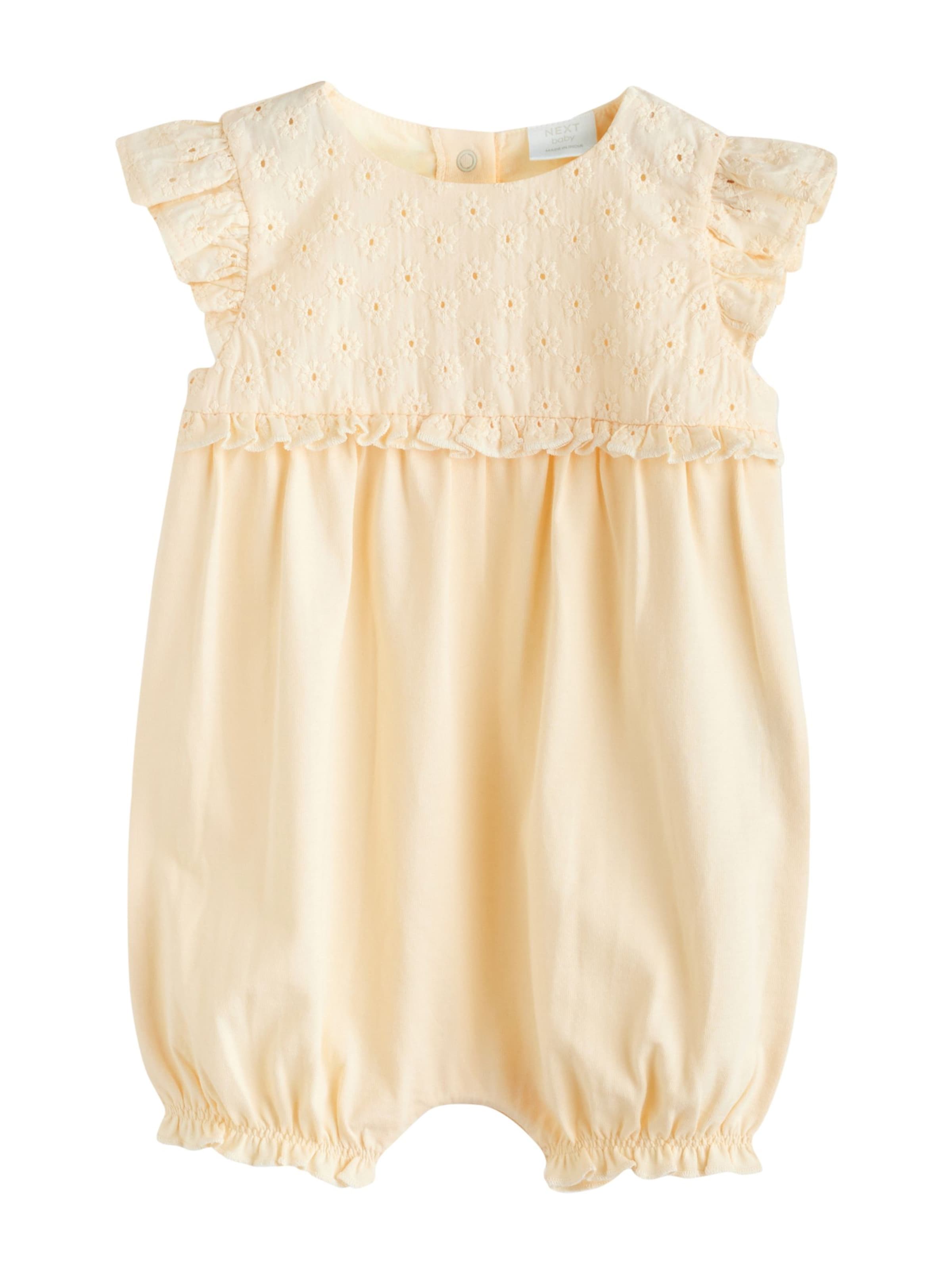 Next - Pijama entero/body en amarillo