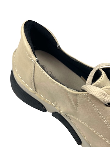 Chaussure à lacets Kumixi en beige