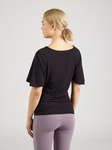 Maglia funzionale di CURARE Yogawear in nero