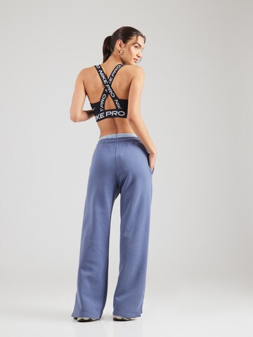 Nike Sportswear Zvonové kalhoty Kalhoty 'PHNX FLC' – modrá