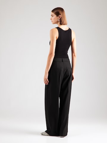 s.Oliver BLACK LABEL - Pierna ancha Pantalón plisado en negro