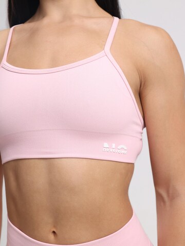 neverover Korzetová Sportovní podprsenka 'Hue Cross-Back Strappy Bra' – pink
