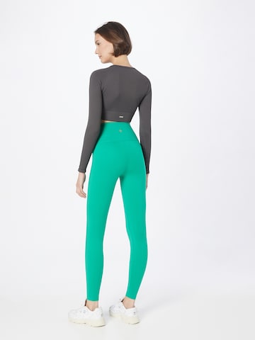 Athlecia Slim fit Workout Pants 'Franz' in Green