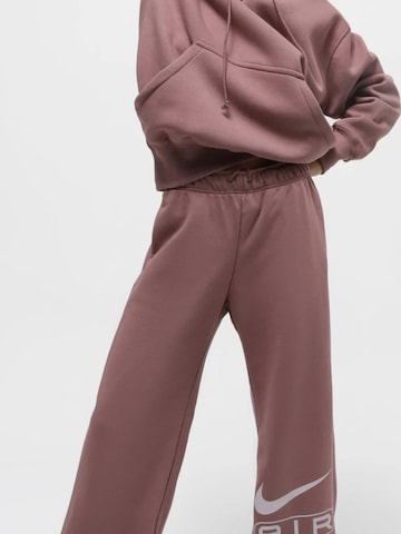 NIKE Regular Sportbroek 'Nike Air Mid-Rise Fleece Jogger' in Roze