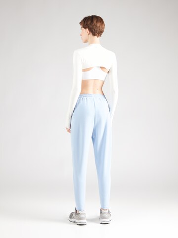 Athlecia - regular Pantalón deportivo 'Jacey V2' en azul