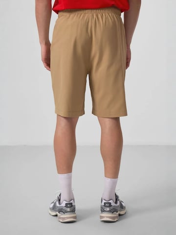 Regular Pantalon chino Tommy Life en marron