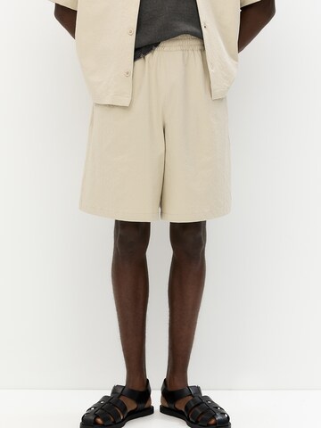 Loosefit Pantalon Pull&Bear en beige : devant