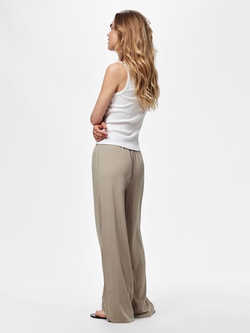 Wide leg Pantaloni 'JABINA' di PIECES in verde