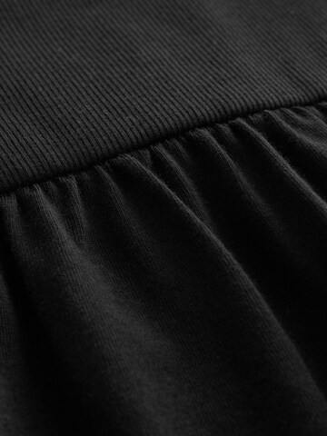 Robe Next en noir