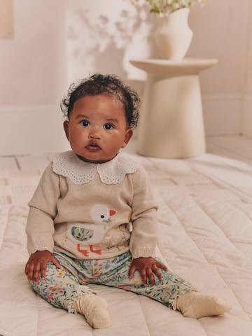 Next Set i beige: framsida