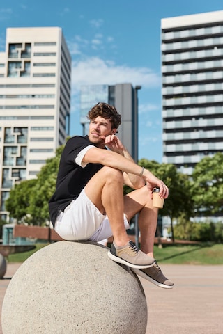 Rieker Slip-Ons in Beige