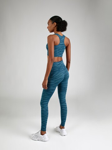 Skinny Pantaloni sportivi di HKMX in blu