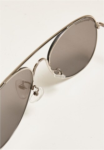 Lunettes de soleil 'Texas' Urban Classics en argent