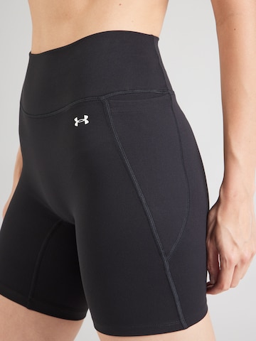 Skinny Pantalon de sport 'Motion' UNDER ARMOUR en noir