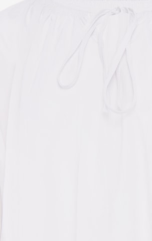 Usha - Blusa em branco: frente
