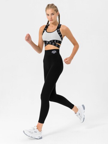 Skinny Pantaloni sportivi 'Naikan' di MOROTAI in nero