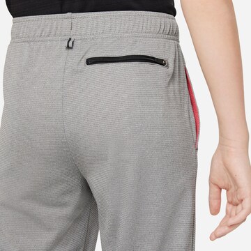 NIKE Regular Workout Pants 'POLY' in Grey