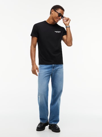 Tommy Jeans - Camiseta 'NY' en negro: frente