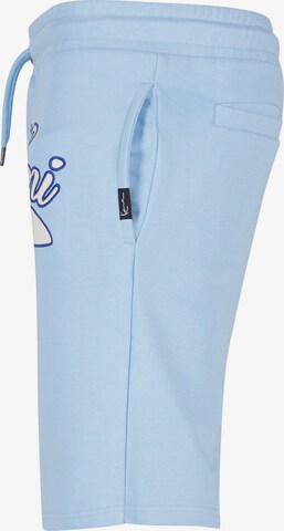 regular Pantaloni di Karl Kani in blu