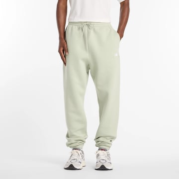 Pantalon 'Essentials' new balance en vert : devant