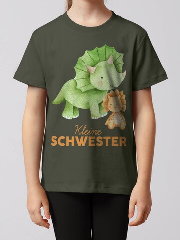 watabout.kids T-Shirt 'Dinosaurier 07 Kleine Schwester' in Grün