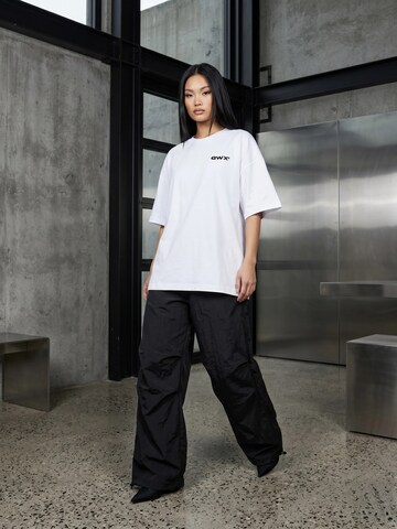 QWX2 - Camiseta talla grande 'UNITY' en blanco