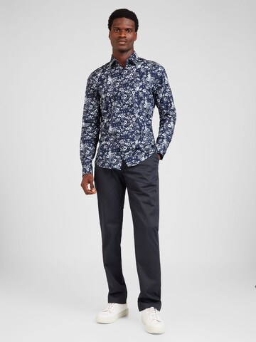 TOMMY HILFIGER - regular Pantalón chino 'Denton' en azul