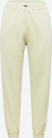 Public Desire Curve Tapered Trousers in Beige: front