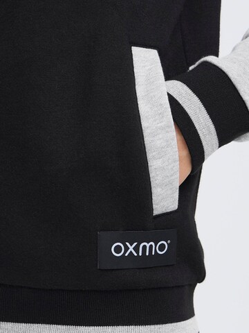 Veste de survêtement ' OXONANA SWEAT JACKET ' Oxmo en noir