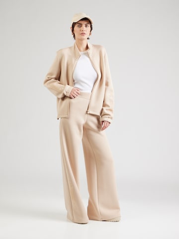 EA7 Emporio Armani Zvonové kalhoty Kalhoty – béžová